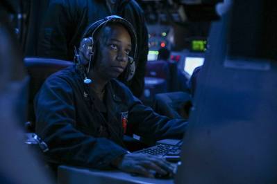 Sept. 20, 2022: Operations Specialist 2nd Class Quiana Jordan, from East Orange, New Jersey, stands tactical information coordinator watch in the combat information center of the guided-missile destroyer USS Higgins (DDG 76) transits through the Taiwan Strait. (U.S. Navy photo by Mass Communication Specialist 1st Class Donavan K. Patubo)